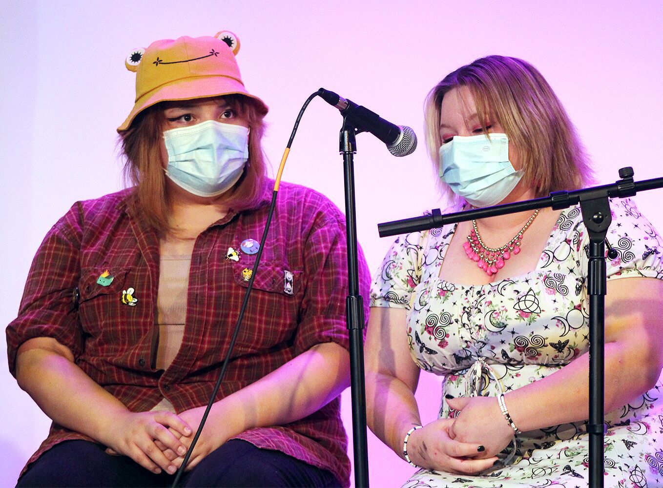 Eneasa Pierre listens to Brittany Morigeau